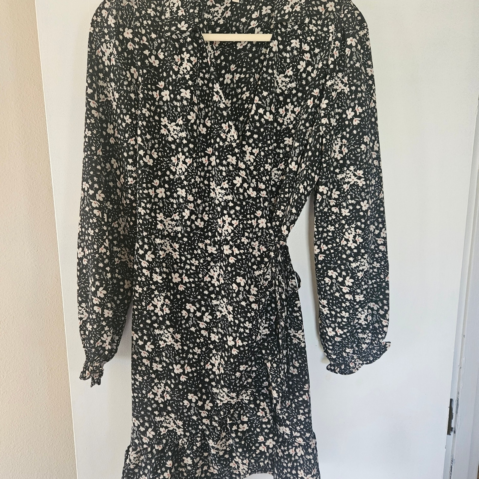 Promesa Black And White Floral Mini Wrap Dress With Ruffled Hem And Long Sleeve